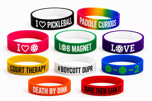 Nine colorful silicone wristbands with various text and graphic designs, arranged on a plain white background.