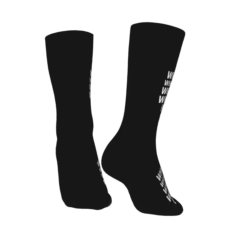 Black socks with white graphic designs on a white background