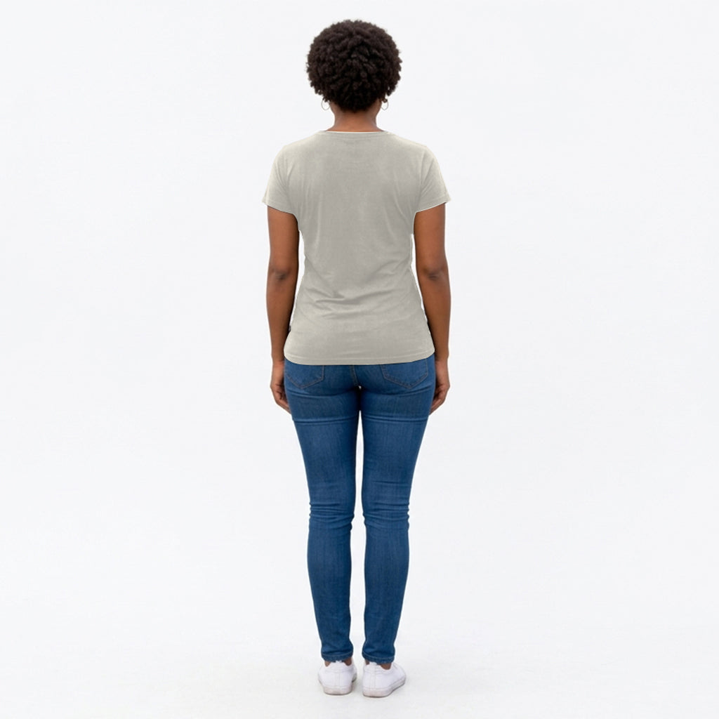 Back view of person wearing a plain white t-shirt and blue jeans on a white background