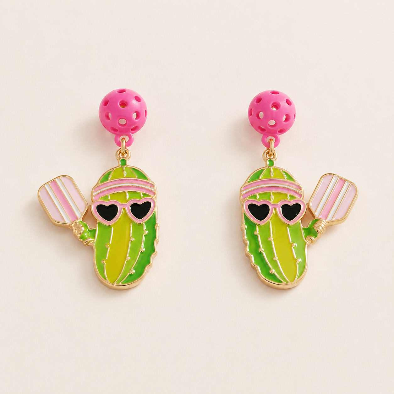 Pickle playing pickleball hypoallergenic earrings on white
