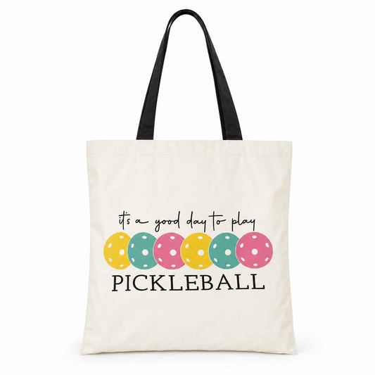 It's a Good Day to Play Pickleball tote bag on white