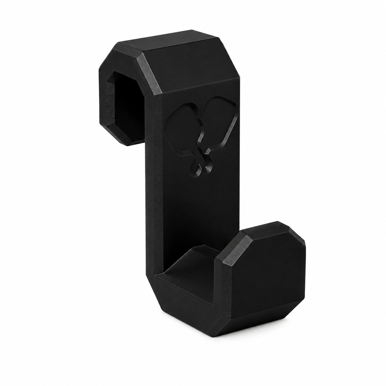 A matte black metal wall hook with a geometric, faceted design and a cutout emblem on the vertical arm, shown on a plain white background.