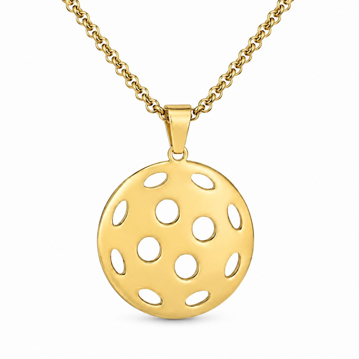 Close-up of the gold hollow pickleball pendant necklace on a white background.