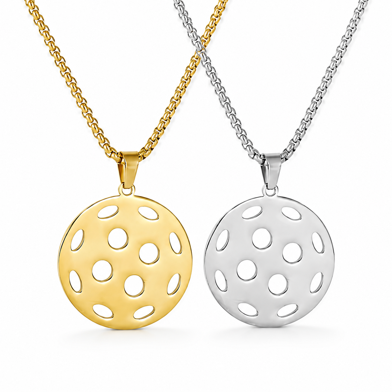 Gold and silver hollow pickleball pendant necklaces displayed side by side on a clean white background.