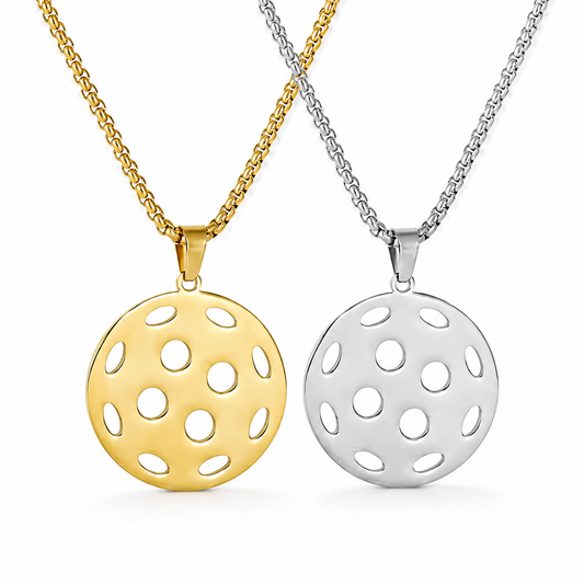 Gold and silver hollow pickleball pendant necklaces displayed side by side on a clean white background.