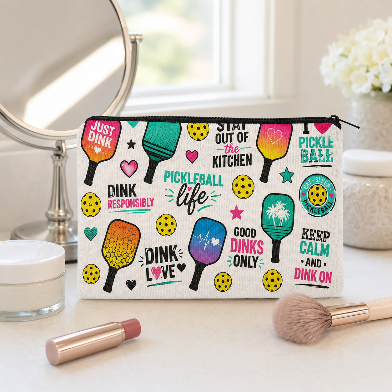 Large colorful pickleball pouch used as a cosmetics bag