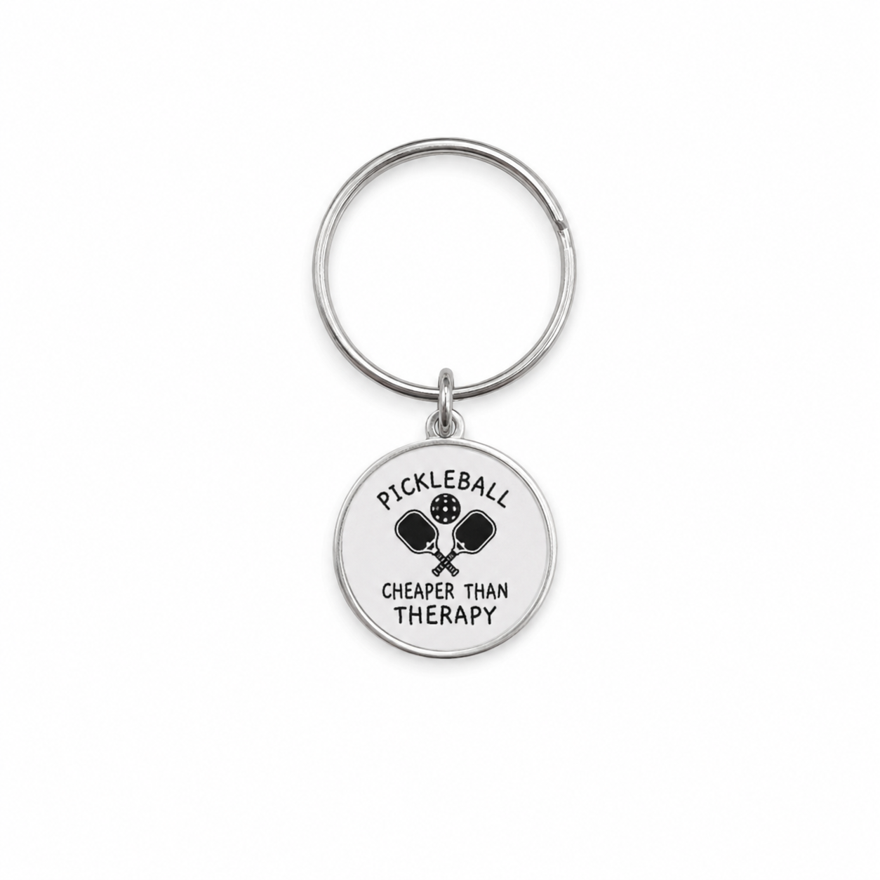 Pickleball Is Cheaper Than Therapy silver-tone keychain on a white background