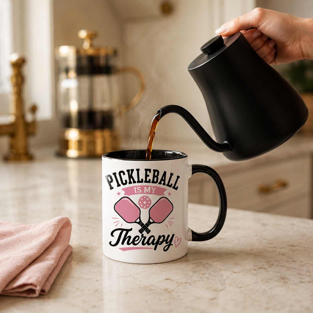 Coffee being poured into a Pickleball Is My Therapy ceramic mug in a bright kitchen