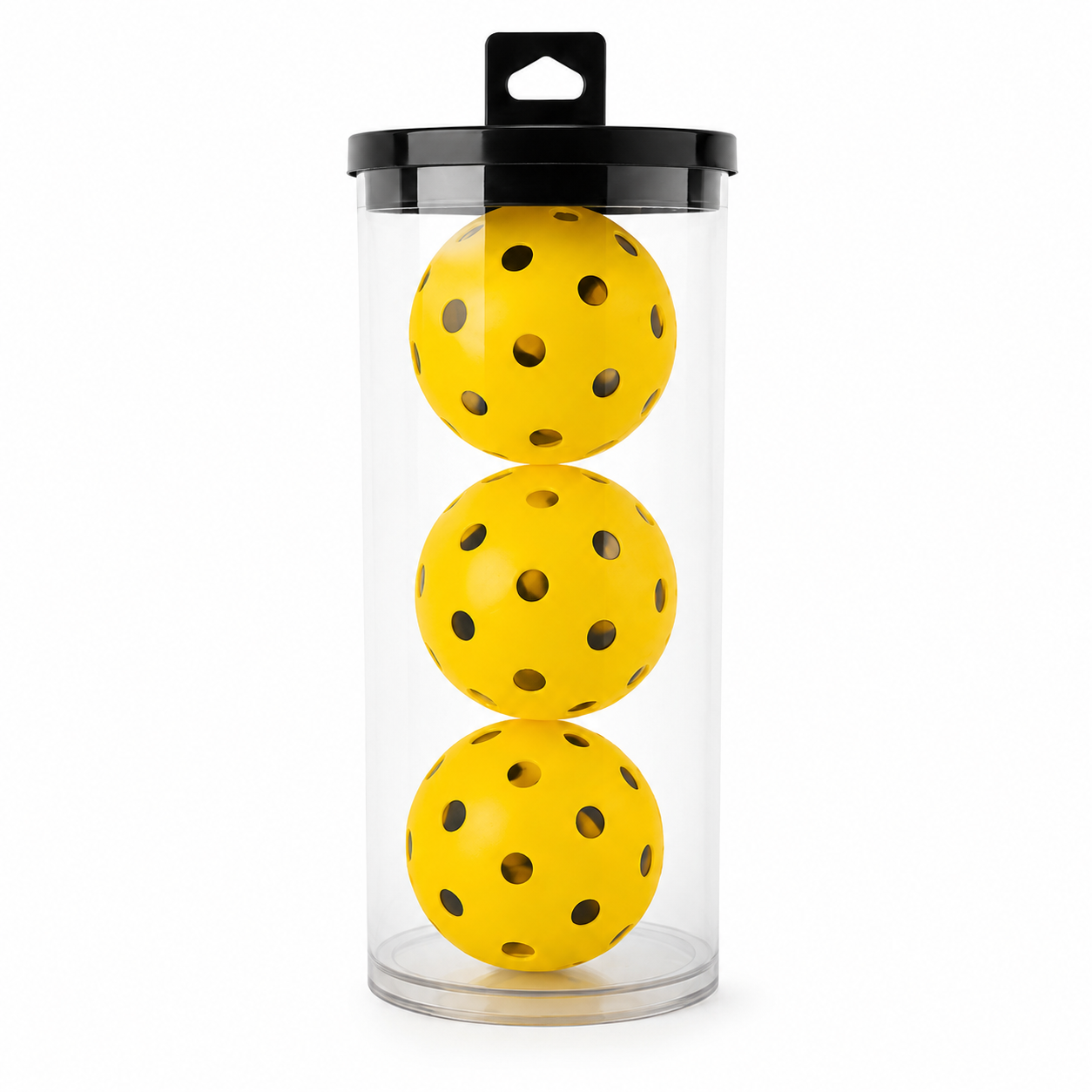 Three yellow silent pickleballs stacked in a clear tube with black lid on a white background
