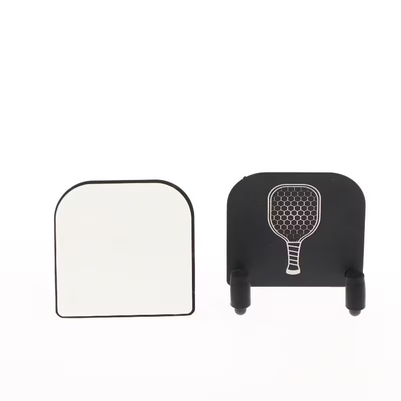 Front and adhesive back views of black wall-mounted pickleball paddle rack