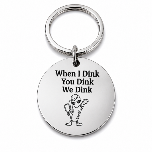 When I Dink You Dink We Dink silver pickleball keychain on white background